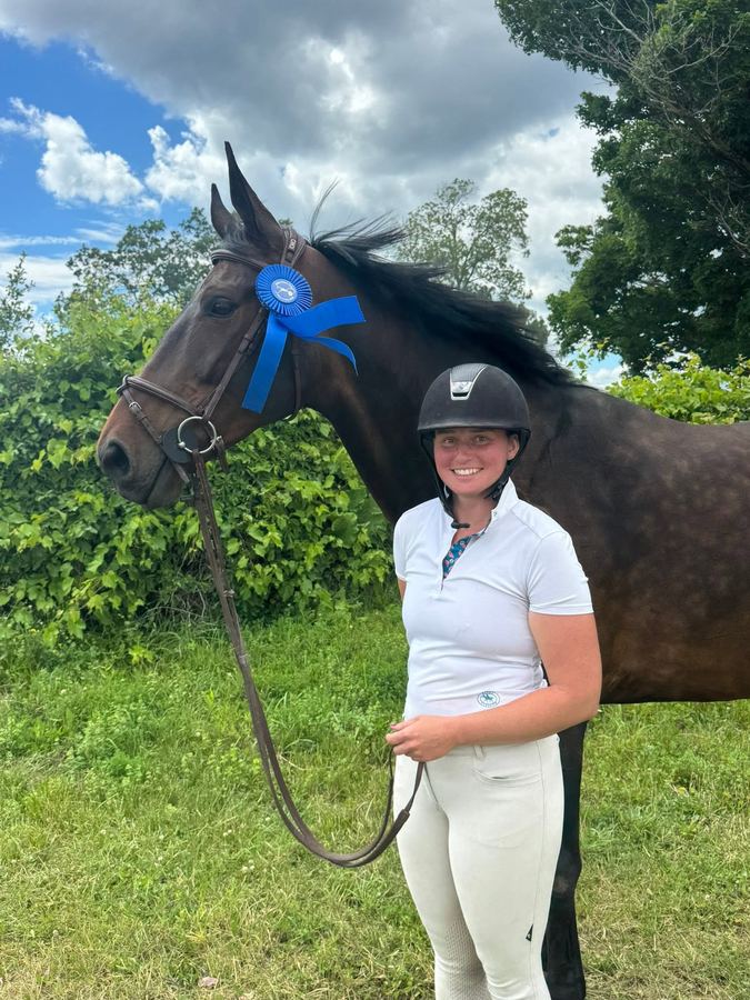 Rider with horse and blue ribbon, Forman Show Stables